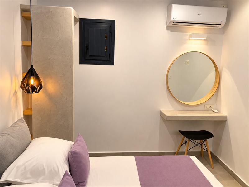 Deluxe Apartment – Outdoor Hot Tub – Bedroom vanity and mirror, Dragonfly Villas Santorini